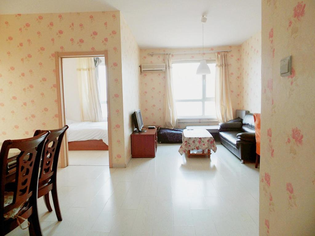 Xinghai Zhilian Apartment Ta-lien Pokoj fotografie
